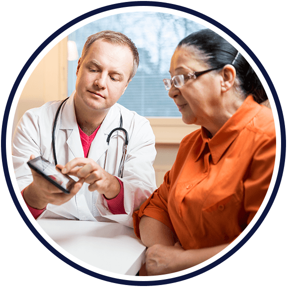 Picture of medical professional reviewing results with a patient