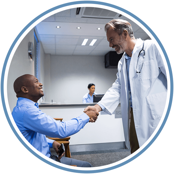 Picture of a medical professional shaking the hand of a patient